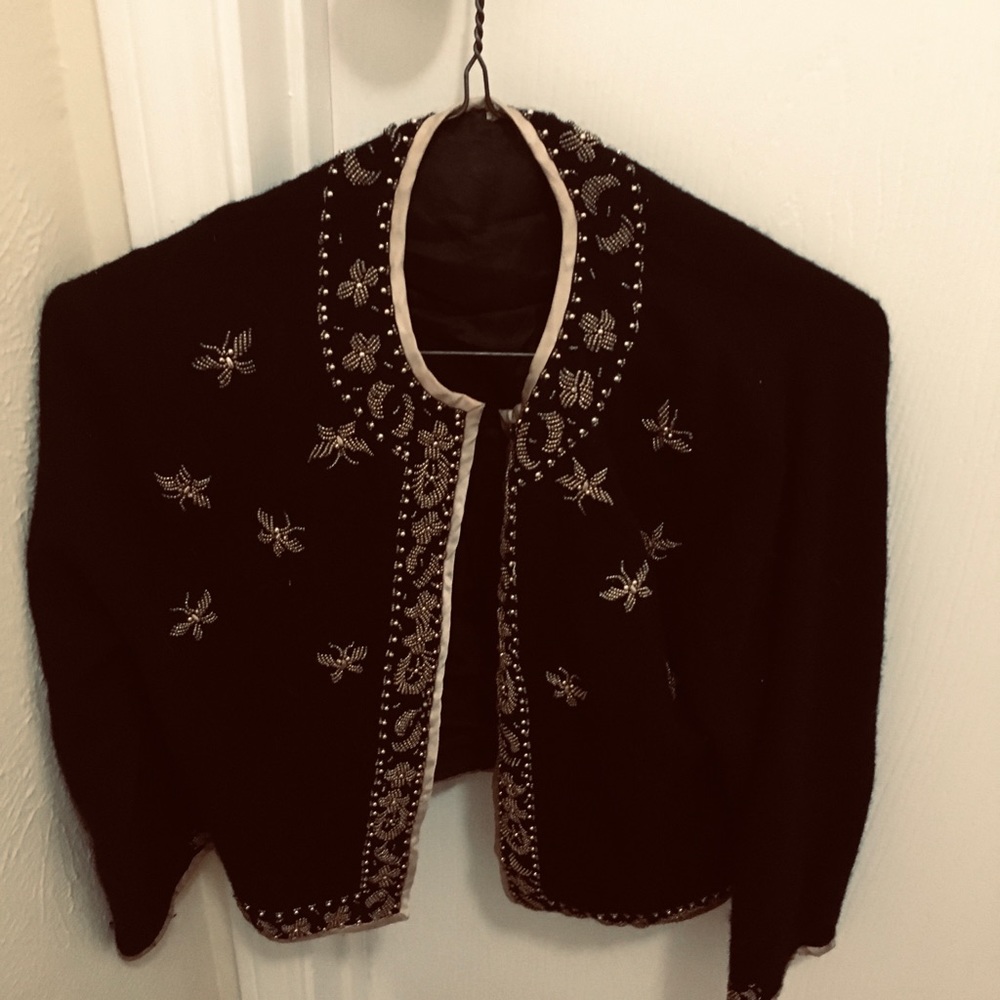 Black jacket with gold beads and facing around